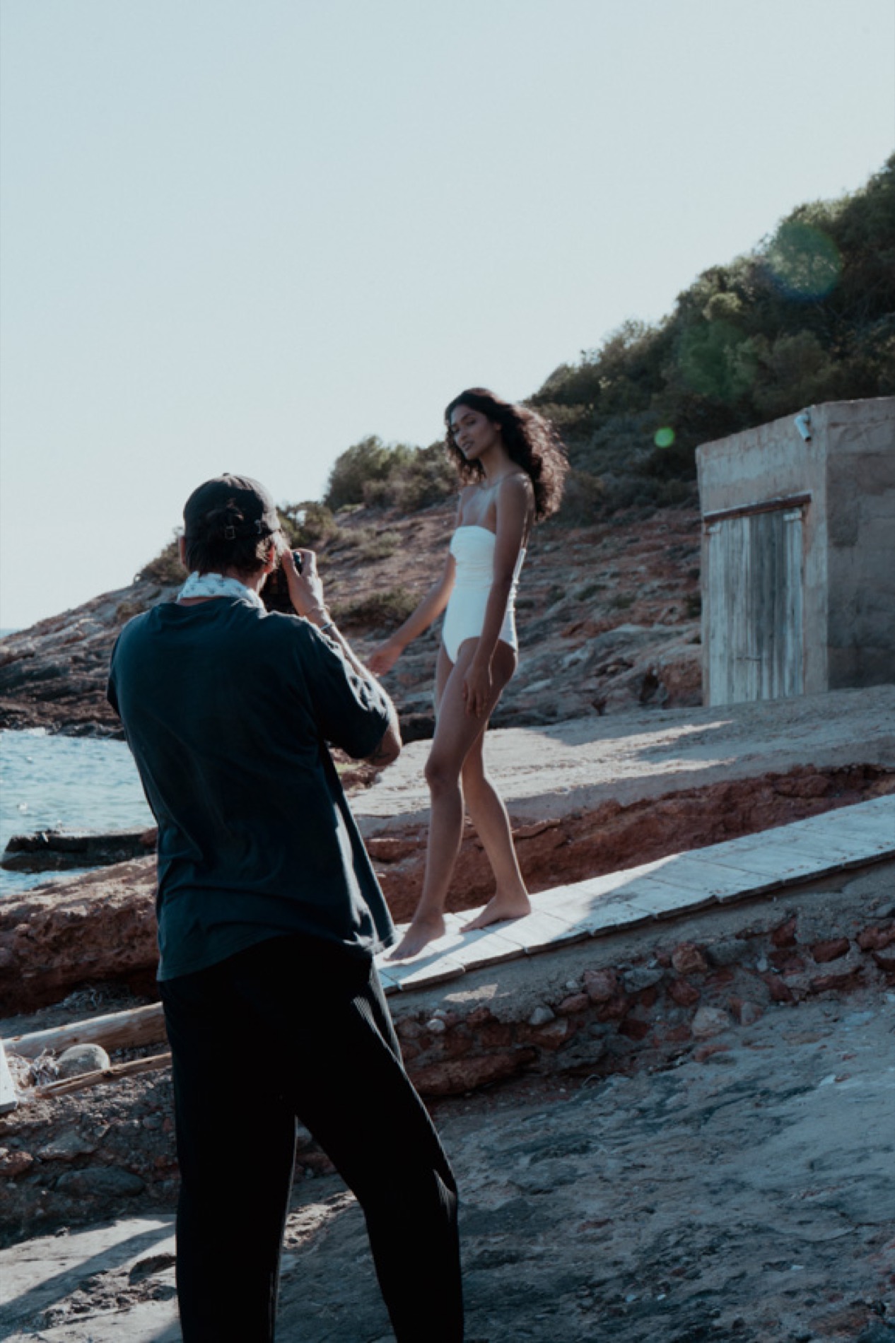 Model portrait on a rocky coastline