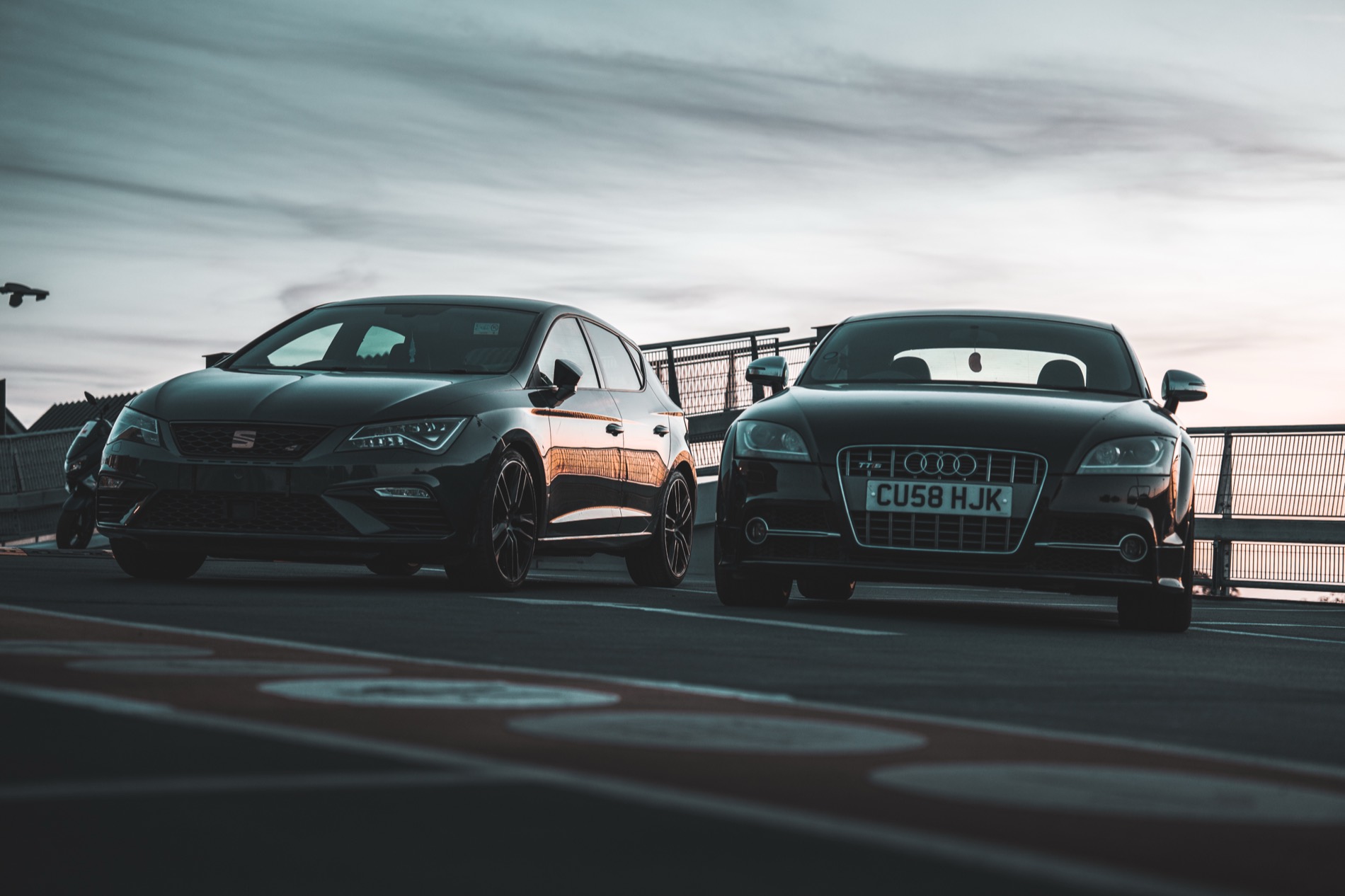 Audi TT in a multi-storey car park at dusk