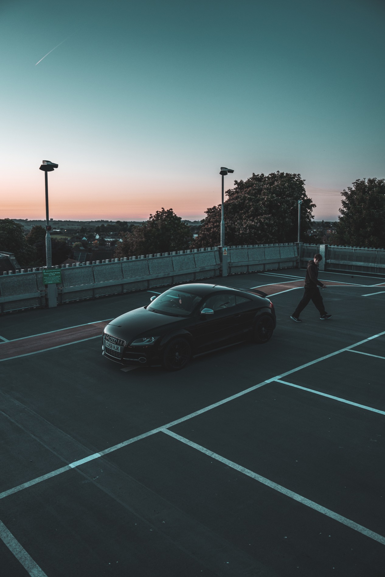 Audi TT on a rooftop at golden hour
