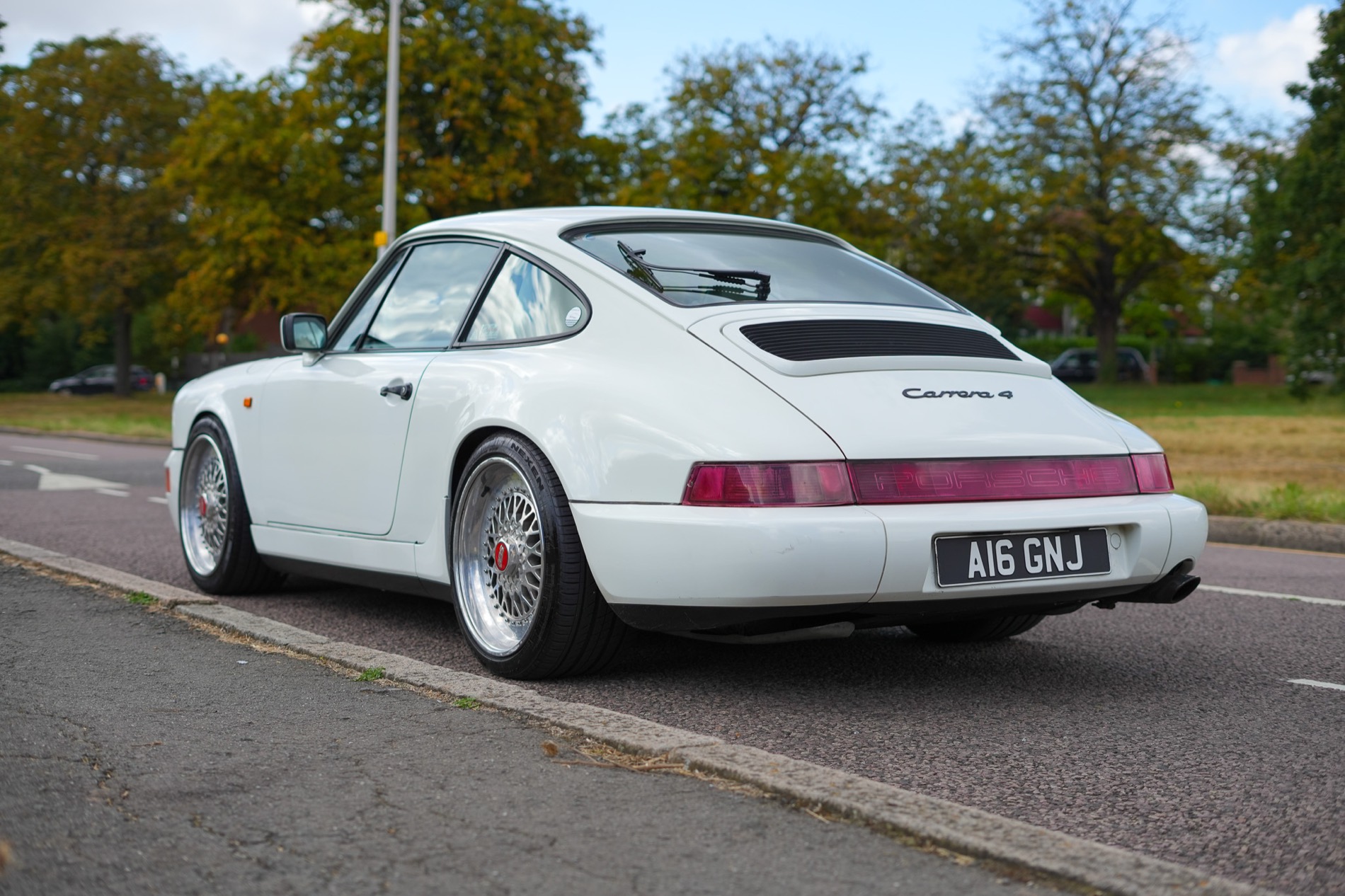 Classic Porsche 911 Carrera 4 roadside
